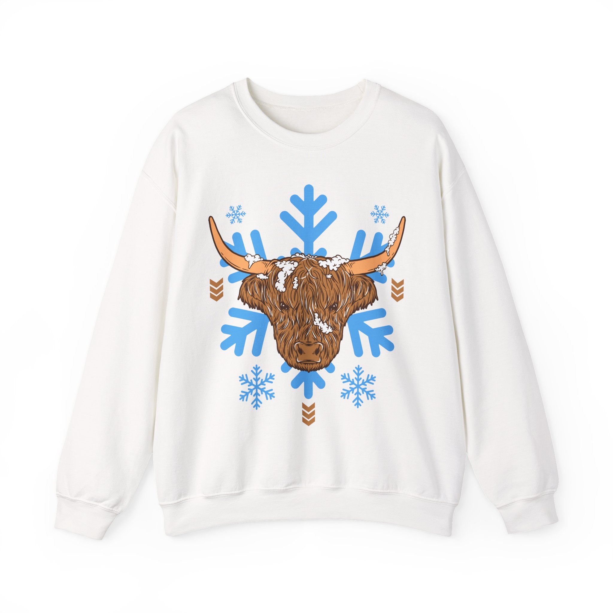 Shaggy brown Highland cow head centered over large light-blue snowflakes