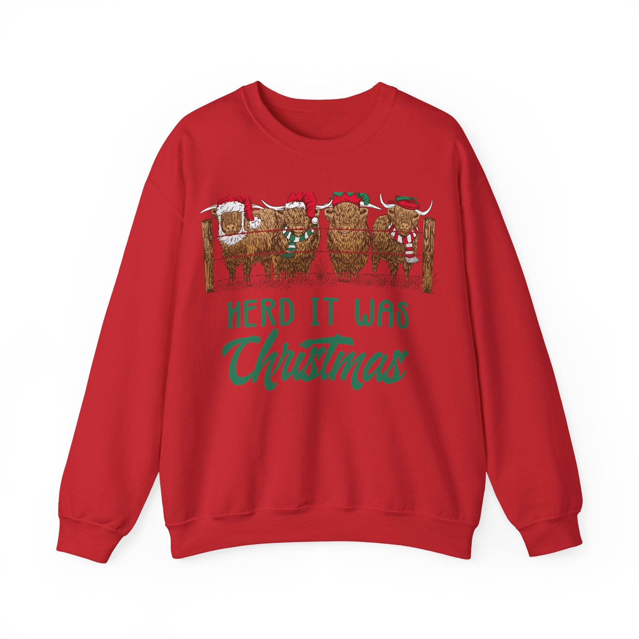Four Highland cows lined up behind a wooden fence wearing Santa and elf hats with Herd It Was Christmas lettering in green and red, color option