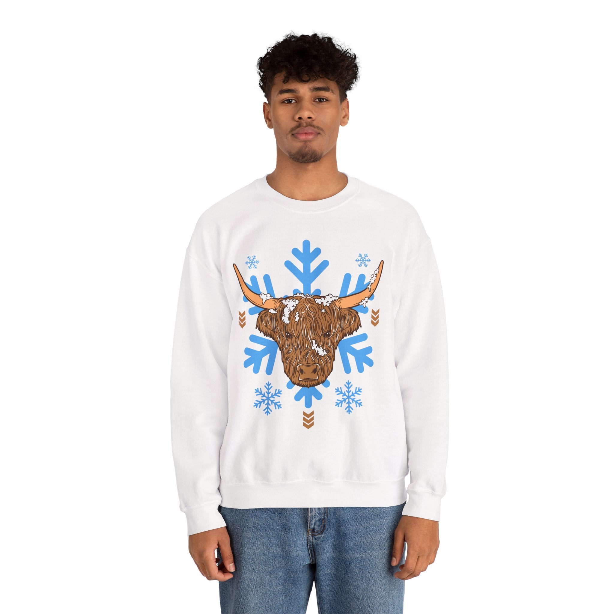 Shaggy brown Highland cow head centered over large light-blue snowflakes, alternate view