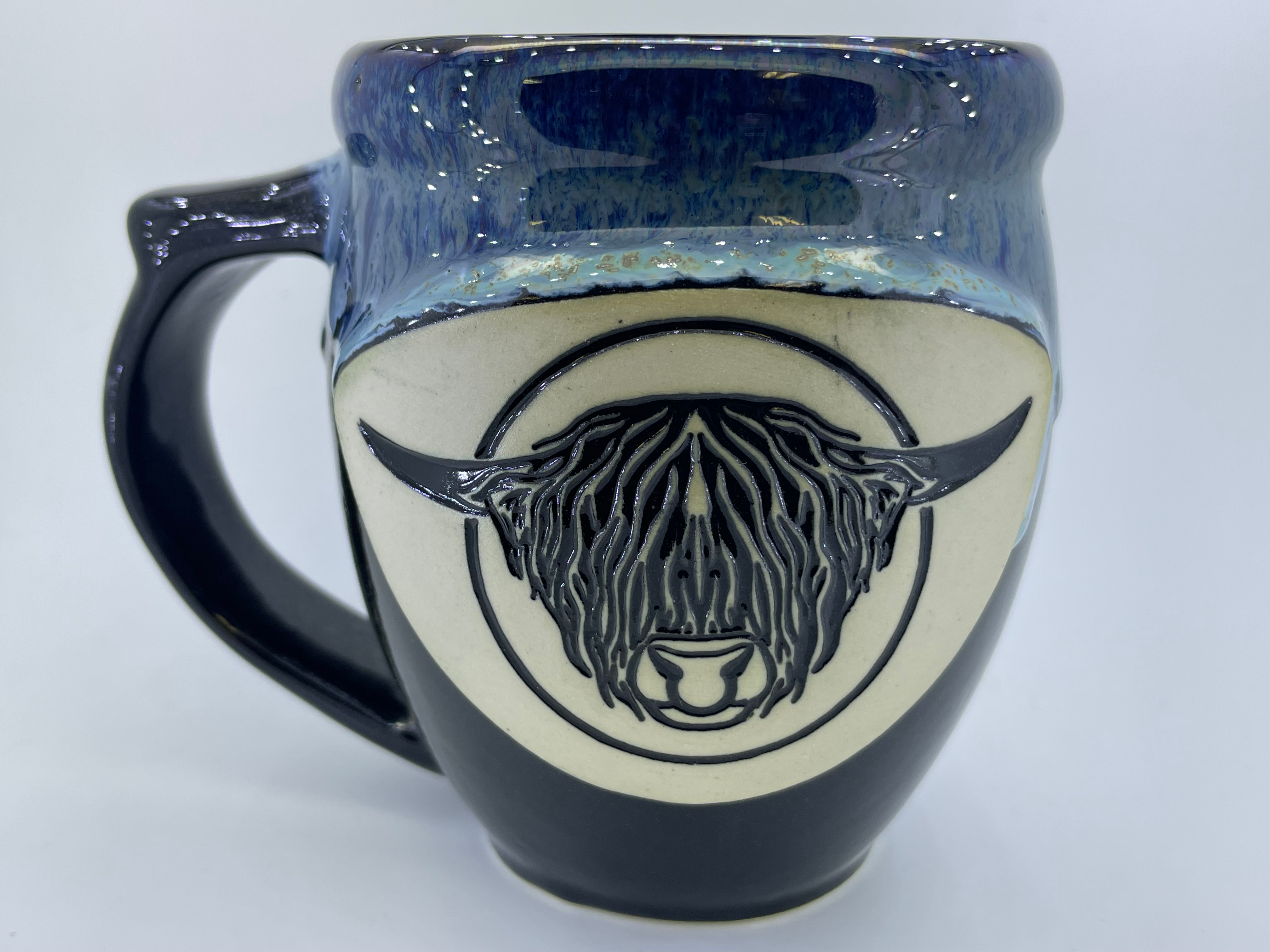 Handmade pottery mug with Highland bull head, alternate view