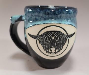 Handmade pottery mug with Highland bull head