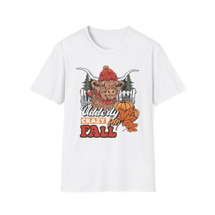 Highland cow wearing a red knit beanie and scarf with pumpkins, pine trees and a fence, Udderly Crazy for Fall lettering