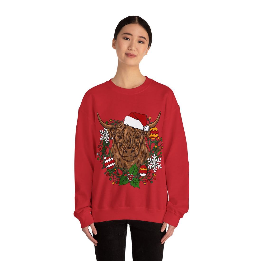 Shaggy Highland cow wearing a Santa hat framed by a holly and ornament Christmas wreath, color option