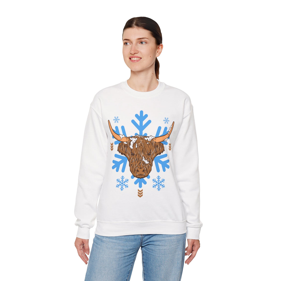 Shaggy brown Highland cow head centered over large light-blue snowflakes, color option
