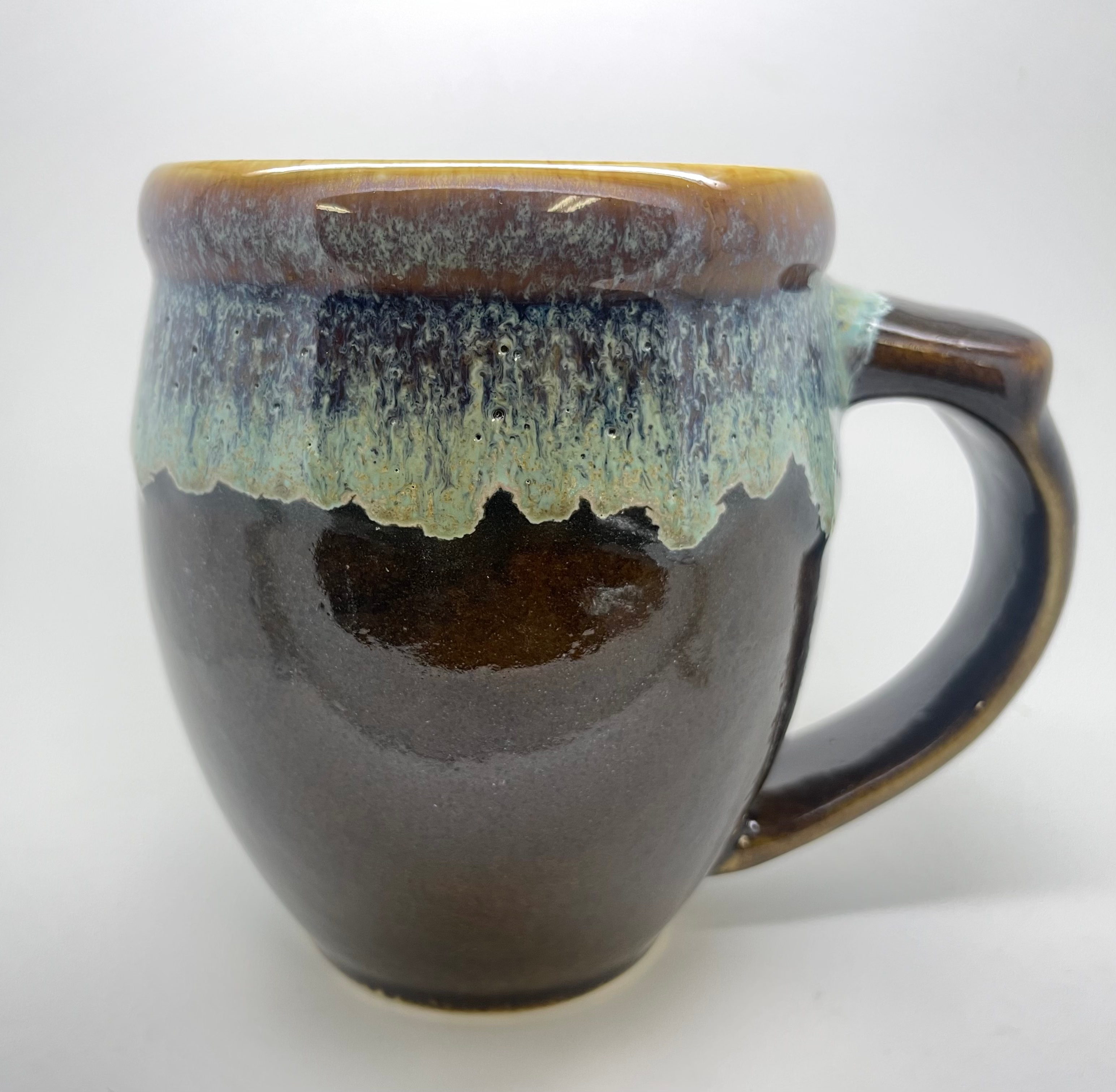 Handmade pottery mug with Highland bull head, alternate view