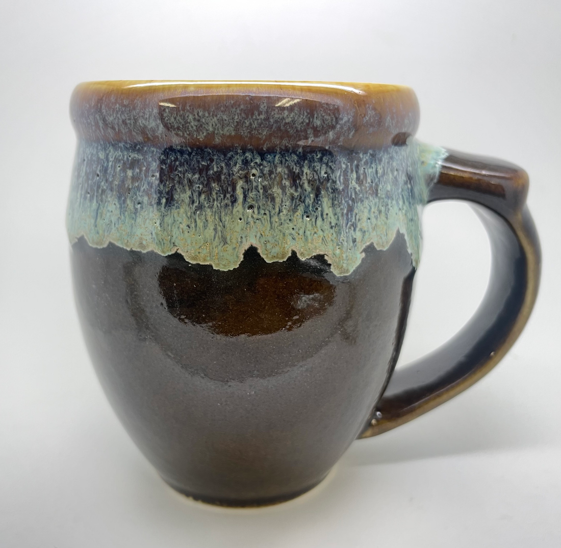 Handmade pottery mug with Highland bull head, alternate view