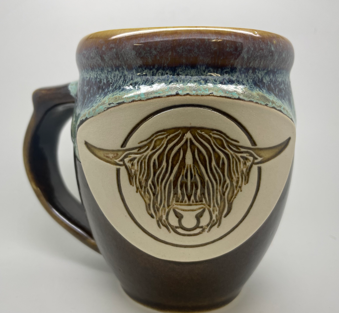 Handmade pottery mug with Highland bull head, alternate view